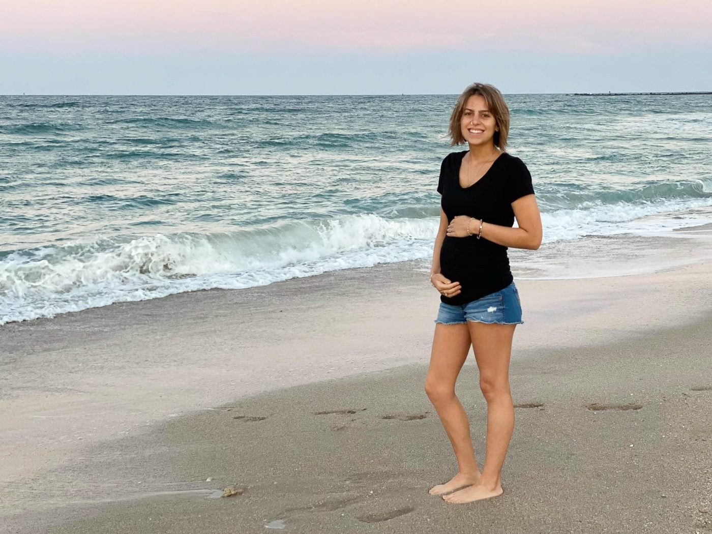 daughter maternity portrait on beach