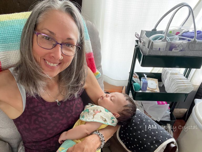 grandmother rocking granddaughter