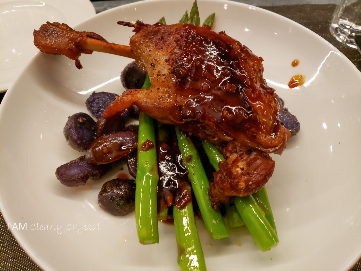 duck with potatoes, asparagus, and sauce